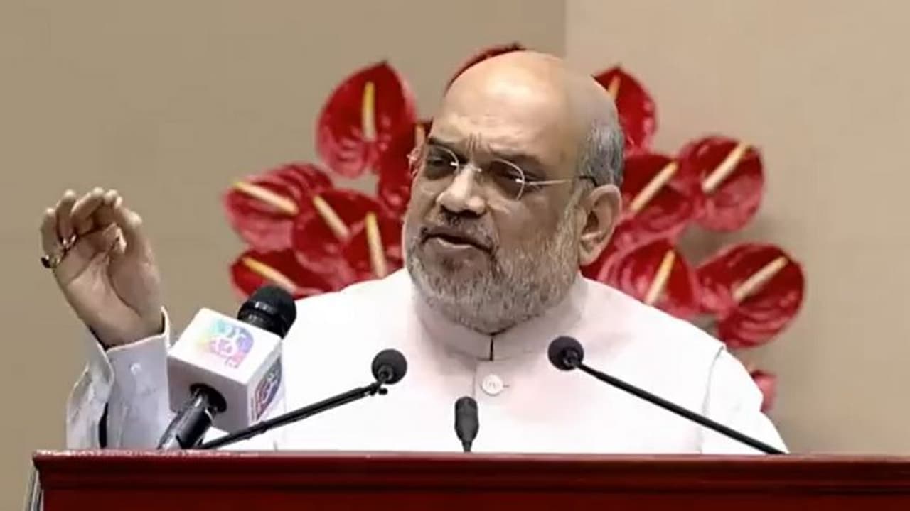 अमित शाह ने किया मोदी @20 पुस्तक का विमोचन, कहा लोगों की खुशी नहीं, भलाई के लिए फैसले लेती है सरकार