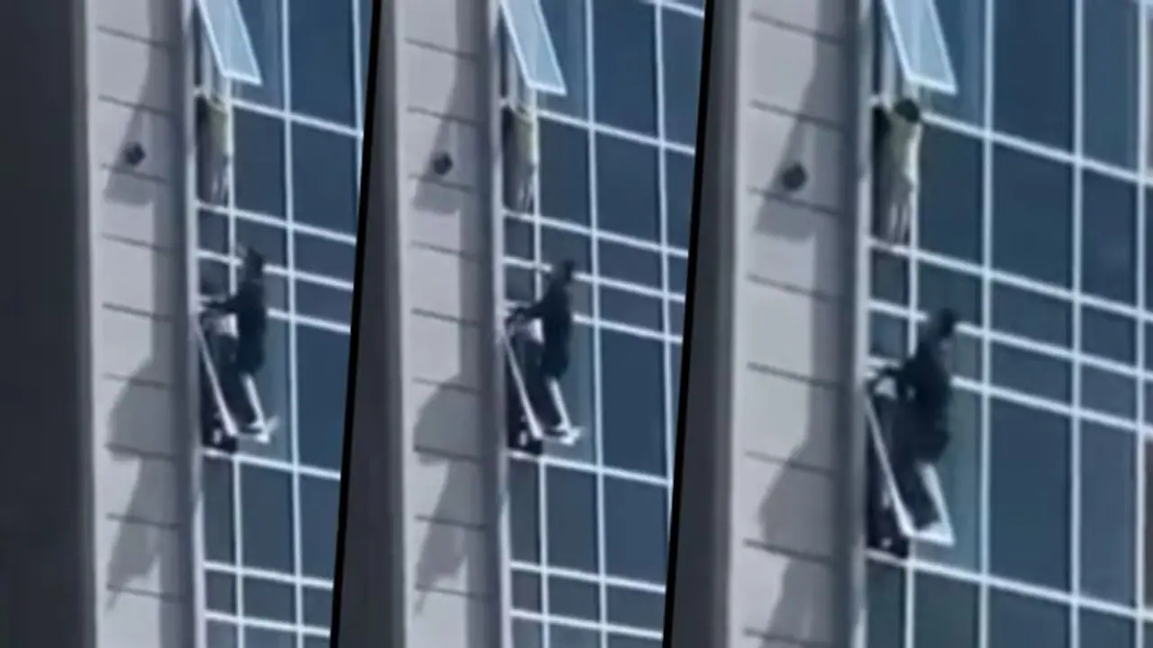 WATCH: Man climbs to the window of 8th floor to save a child