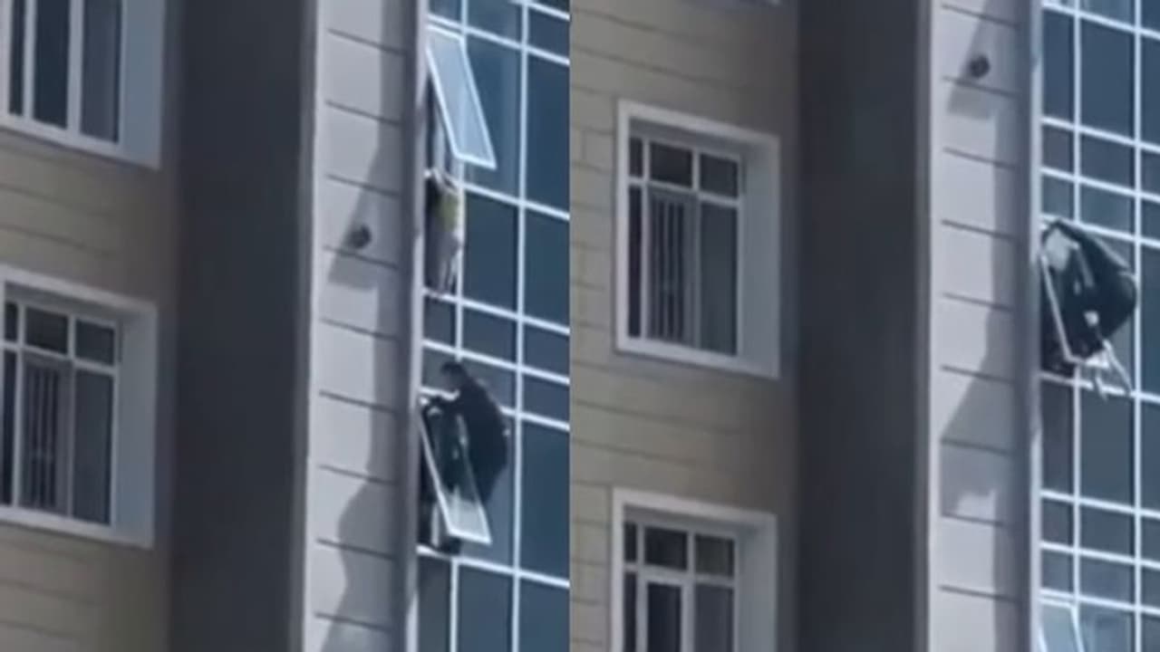 Rescue Video : എട്ടാം നിലയിലെ ജനാലയില്‍ കുടുങ്ങി കുഞ്ഞ്; നെഞ്ചിടിക്കുന്ന വീഡിയോ