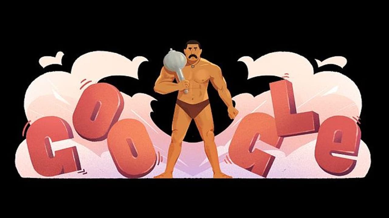 গদা হাতে দাঁড়িয়ে একজন কুস্তিগির, গামা পালোয়ানের জন্মদিনে বিশেষ শ্রদ্ধা গুগলের গদা হাতে দাঁড়িয়ে একজন কুস্তিগির, গামা পালোয়ানের জন্মদিনে বিশেষ শ্রদ্ধা গুগলের