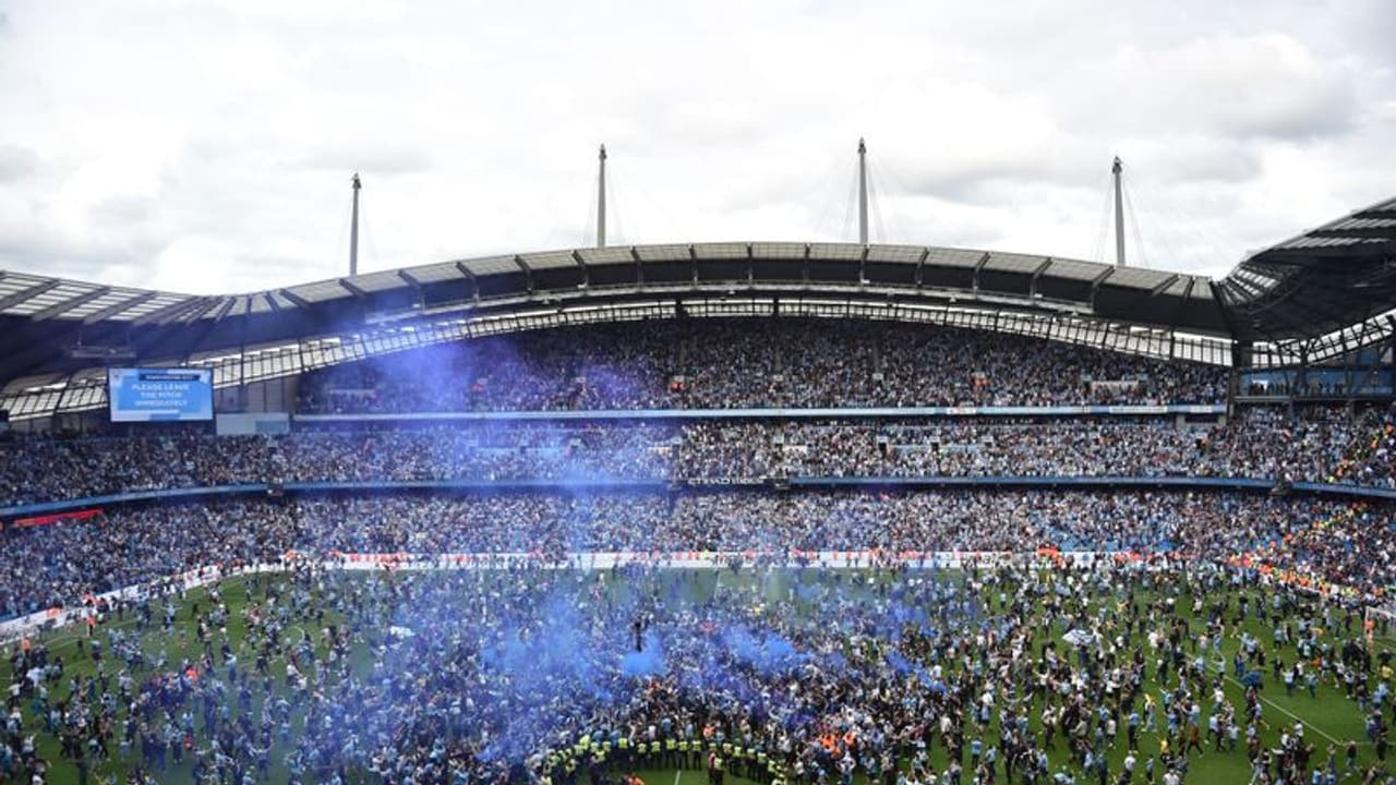 EPL 2021 22: 2 fans charged by GMP for pitch invasion during Man City's title win at Etihad EPL 2021 22: 2 fans charged by GMP for pitch invasion during Man City's title win at Etihad