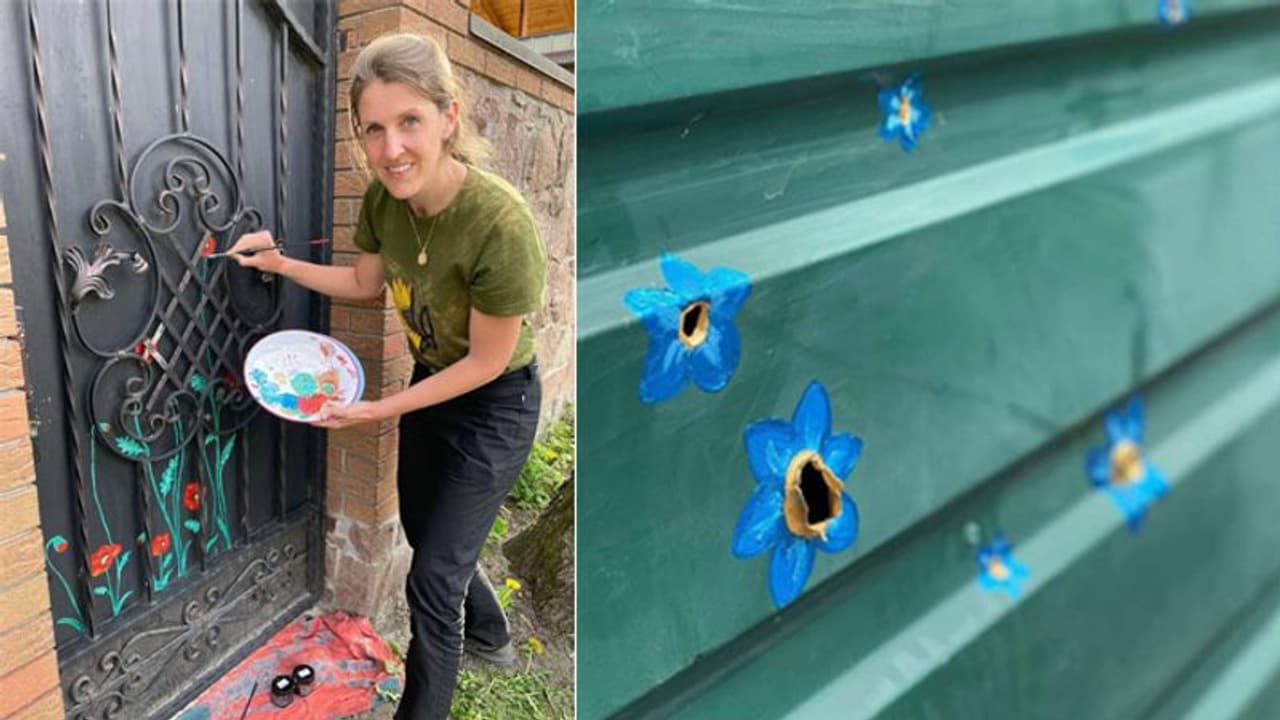 गोलियों की आर्ट लीला: गेट पर हुए छेदों को टोरंटो से यूक्रेन पहुंची इस आर्टिस्ट ने 'झांकने' लायक बना दिया गोलियों की आर्ट लीला: गेट पर हुए छेदों को टोरंटो से यूक्रेन पहुंची इस आर्टिस्ट ने 'झांकने' लायक बना दिया