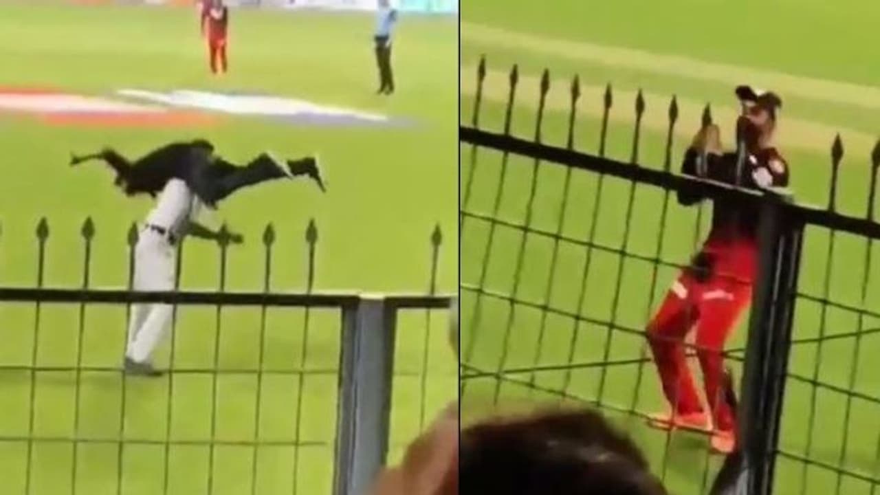 IPL 2022: ഗ്രൗണ്ടില് ചാടിയിറങ്ങിയ ആരാധകനെ ഒറ്റക്ക് പൊക്കിയെടുത്ത് പൊലീസുകാരന്, അന്തംവിട്ട് കോലി IPL 2022: ഗ്രൗണ്ടില് ചാടിയിറങ്ങിയ ആരാധകനെ ഒറ്റക്ക് പൊക്കിയെടുത്ത് പൊലീസുകാരന്, അന്തംവിട്ട് കോലി