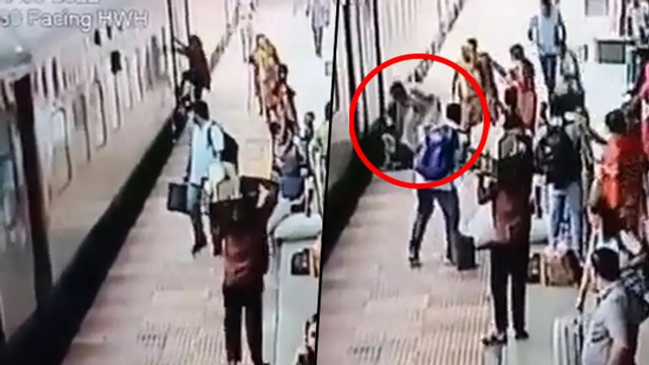 RPF personnel saves woman from mishap as she attempts to board a moving train; watch RPF personnel saves woman from mishap as she attempts to board a moving train; watch