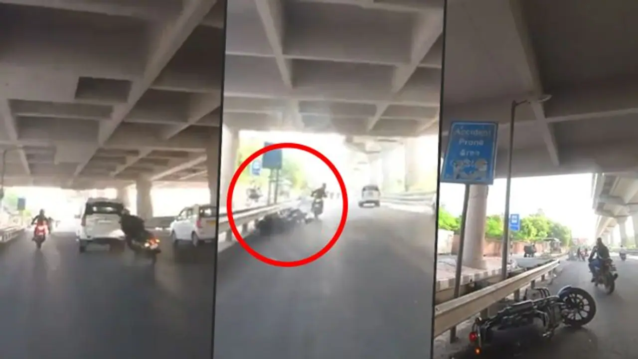 Shocking road rage caught on cam; Car collides biker Shocking road rage caught on cam; Car collides biker