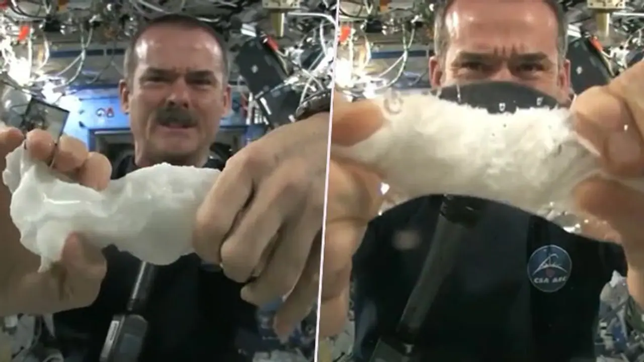 Astronaut demonstrates the result of squeezing a wet towel in space: video goes viral