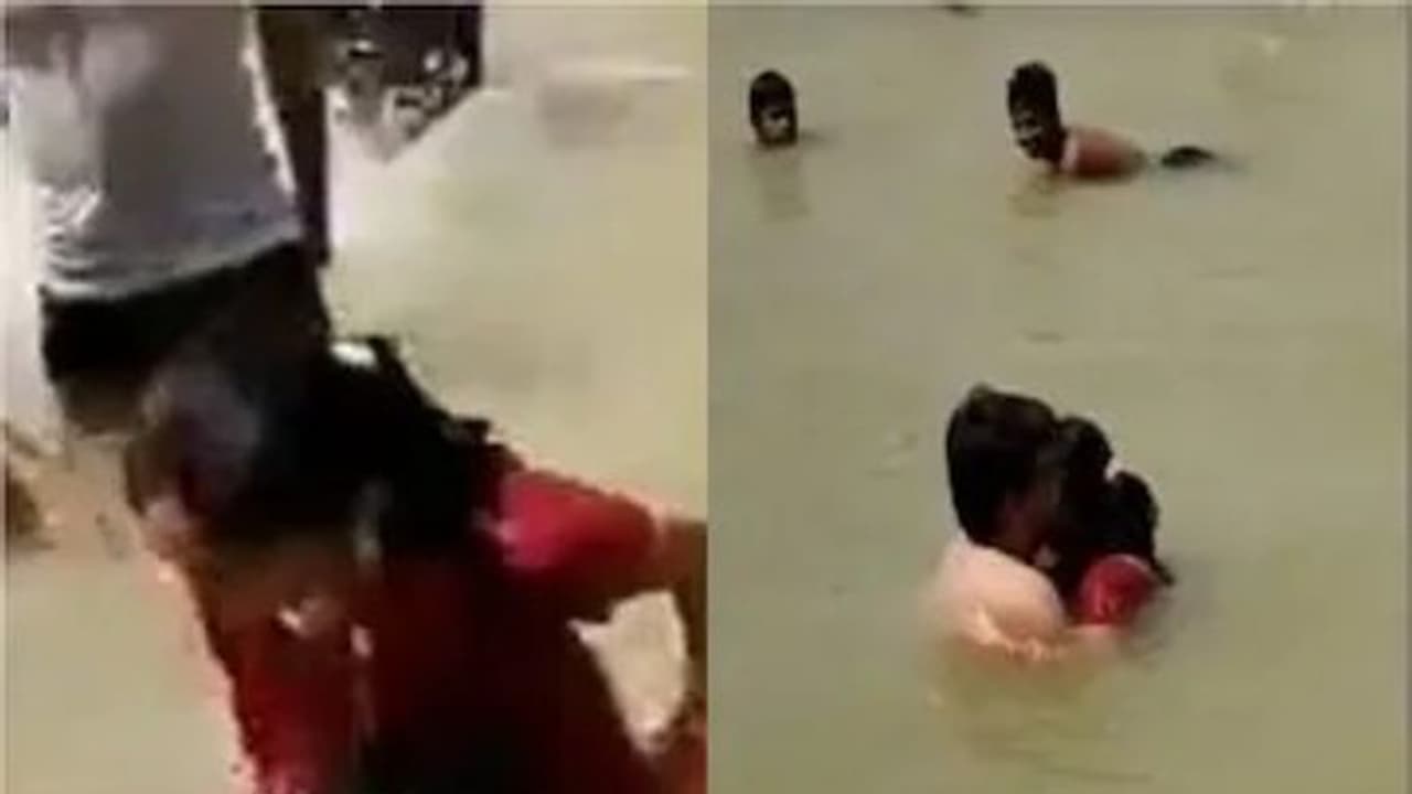 நதியில் நீராடியபடியே முத்தம் கொடுத்து உல்லாசம்.. புதுமண தம்பதியரை வெளுத்து கட்டிய கூட்டம்.. போலீஸ் FIR. நதியில் நீராடியபடியே முத்தம் கொடுத்து உல்லாசம்.. புதுமண தம்பதியரை வெளுத்து கட்டிய கூட்டம்.. போலீஸ் FIR.