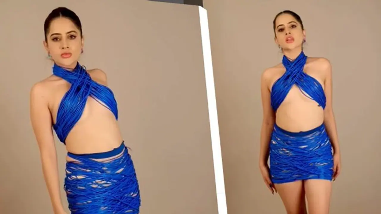 পোশাক বলতে কয়েক গোছা 'তার', নতুন পোশাকে সবাইকে চমকে দিলেন উরফি!