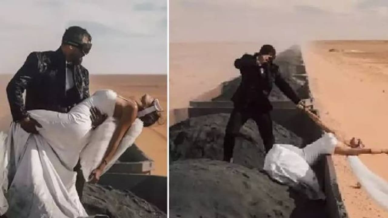 അപകടകരമായ ട്രെയിനിന് മുകളിൽ ദമ്പതികളുടെ ഫോട്ടോഷൂട്ട്!