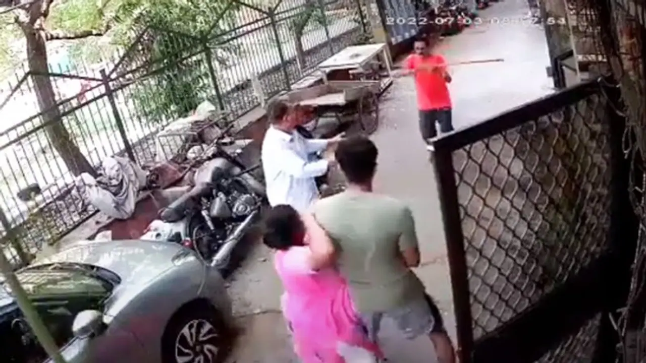 Delhi man attacks three neighbours with an iron rod over pet dog barking: spine chilling video goes viral Delhi man attacks three neighbours with an iron rod over pet dog barking: spine chilling video goes viral