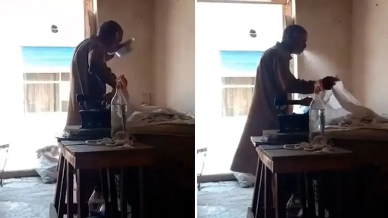 Viral video shows man spitting on clothes while ironing them