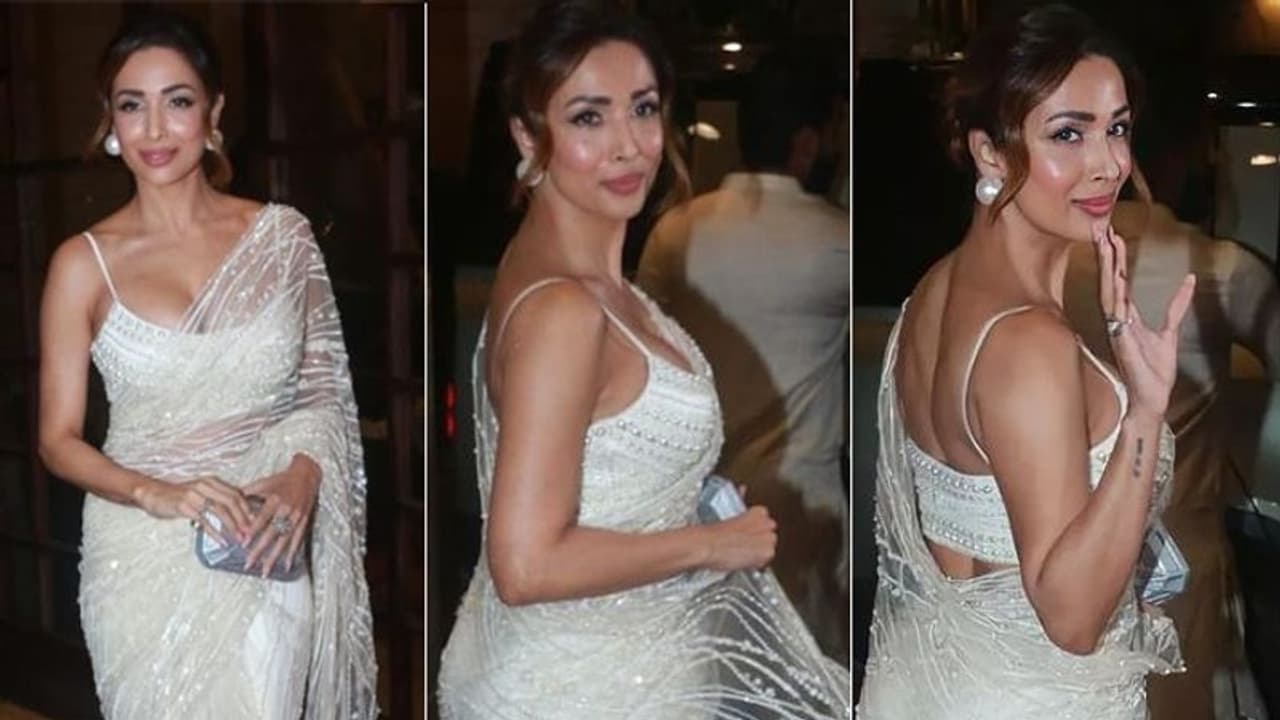 सफेद साड़ी पहन ट्रेडिशनल लुक में दिखी मलाइका अरोड़ा इस वजह से हुई ट्रोल, सुनने मिले ऐसे ऐसे ताने सफेद साड़ी पहन ट्रेडिशनल लुक में दिखी मलाइका अरोड़ा इस वजह से हुई ट्रोल, सुनने मिले ऐसे ऐसे ताने