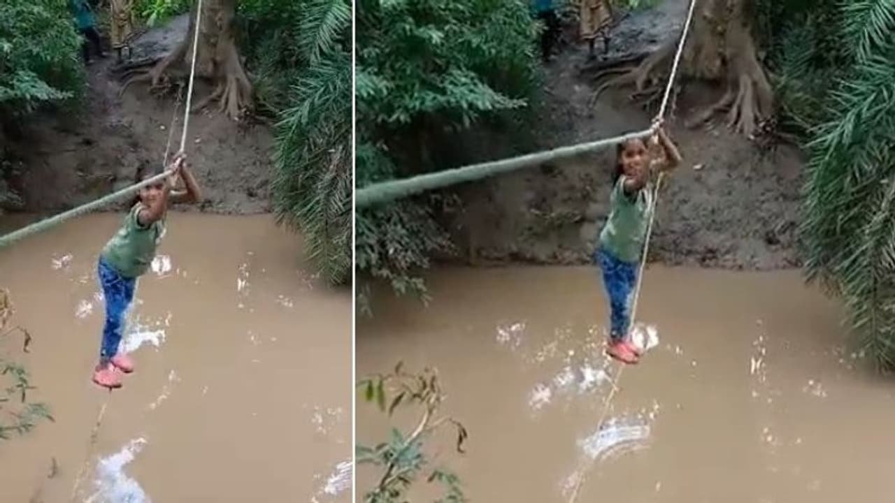 സര്‍ക്കസുകാരെ പോലെ വിദ്യാര്‍ത്ഥികള്‍; കയറില്‍ പുഴ കടന്ന് സ്കൂളിലേക്ക്...