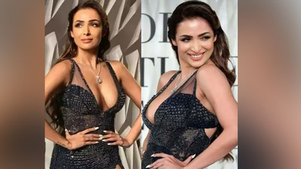 মালাইকার সুডৌল স্তনে সটান হাত এক ব্যক্তির, কী কান্ডটাই না ঘটালেন ফ্যাশনিস্তা, ভিডিও ভাইরাল মালাইকার সুডৌল স্তনে সটান হাত এক ব্যক্তির, কী কান্ডটাই না ঘটালেন ফ্যাশনিস্তা, ভিডিও ভাইরাল