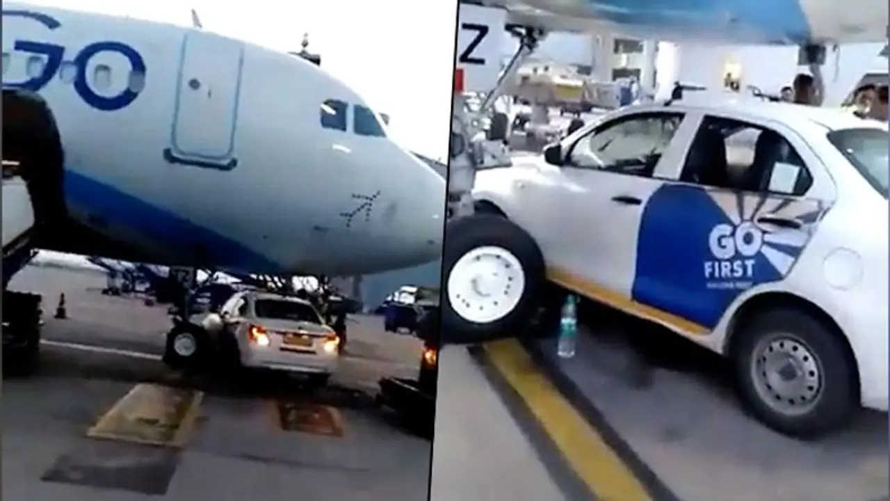 Go First car goes under IndiGo plane; narrowly escapes collision with nose wheel at Delhi airport Go First car goes under IndiGo plane; narrowly escapes collision with nose wheel at Delhi airport
