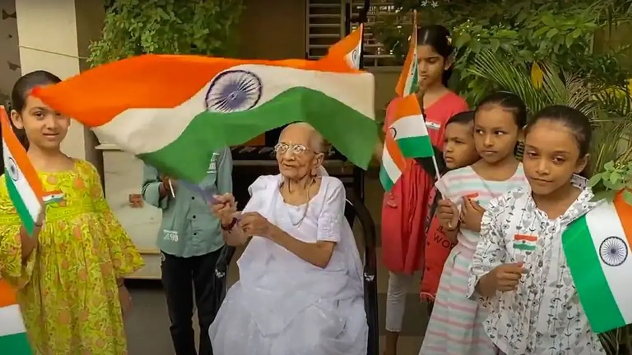 PM Modi's mother joins 'Har Ghar Tiranga' campaign; distributes national flags