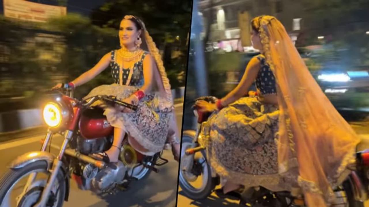 Watch: Woman dressed as bride rides bullet to the wedding venue; viral video Watch: Woman dressed as bride rides bullet to the wedding venue; viral video