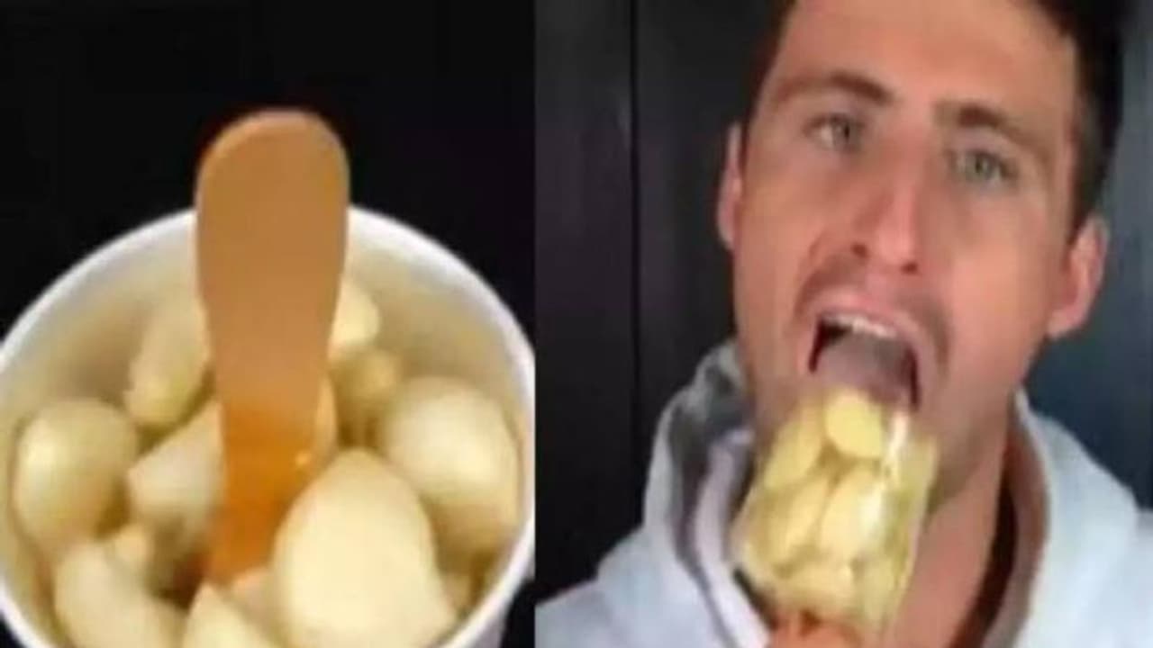 വെള്ളുത്തുള്ളി ഐസ് കഴിക്കാൻ വെല്ലുവിളിച്ച് യുവാവ്; മുട്ടുമടക്കി സോഷ്യൽ മീഡിയ