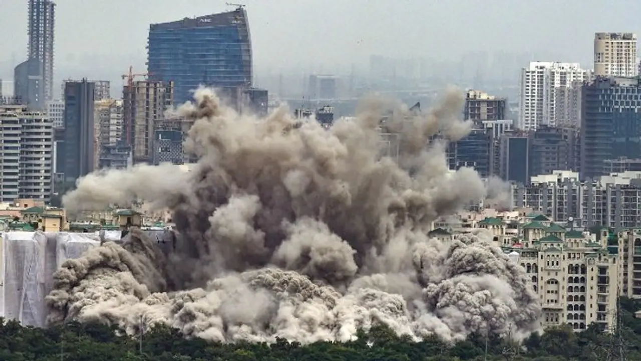 'নাকে তেল ঢেলে ঘুমাচ্ছিলেন?' নয়ডার টুইন টাওয়ার ধ্বংসের দিন সাইরেনের আয়াজেও ঘুম ভাঙেনি এক আবাসিকের 'নাকে তেল ঢেলে ঘুমাচ্ছিলেন?' নয়ডার টুইন টাওয়ার ধ্বংসের দিন সাইরেনের আয়াজেও ঘুম ভাঙেনি এক আবাসিকের