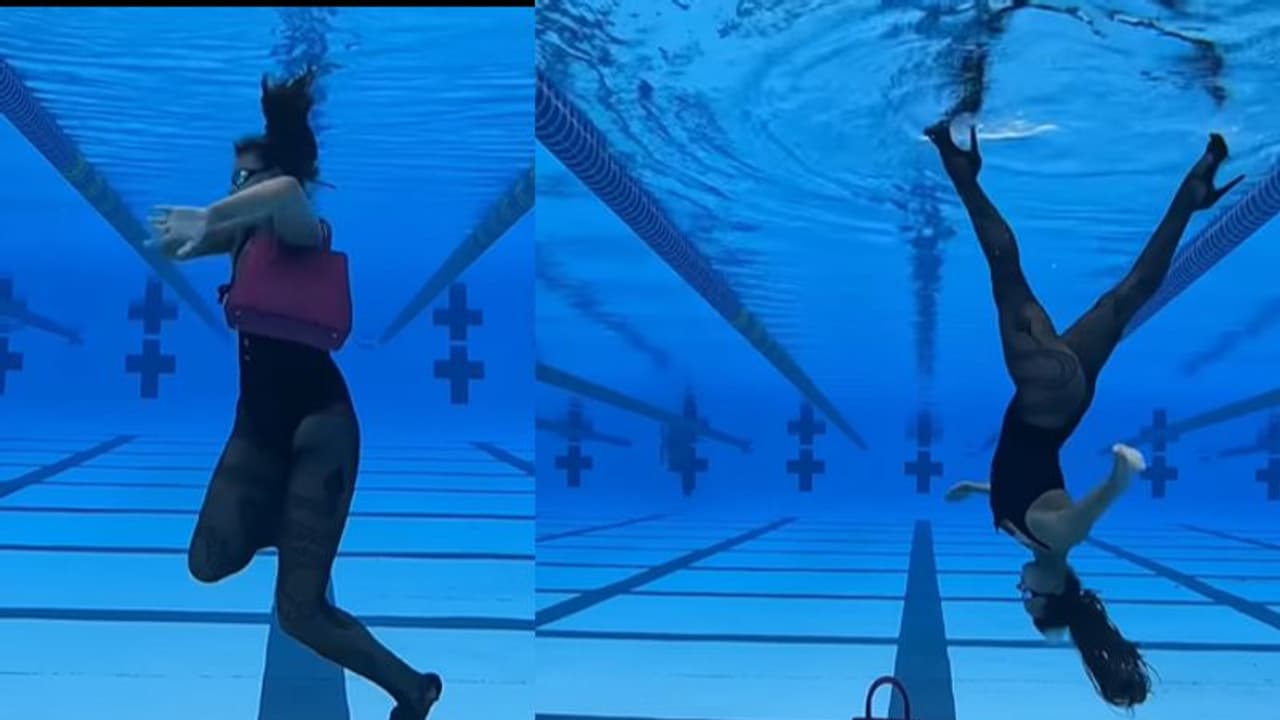 জলের তলায় উল্টো ক্যাটওয়াক, চোখধাঁধানো ভিডিওতে মহিলার কেরামতিতে তোলপাড় নেটদুনিয়া জলের তলায় উল্টো ক্যাটওয়াক, চোখধাঁধানো ভিডিওতে মহিলার কেরামতিতে তোলপাড় নেটদুনিয়া