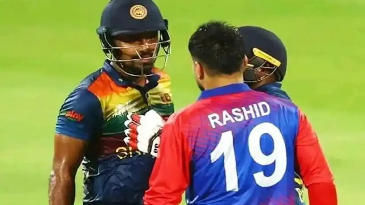 Asia Cup: தனுஷ்கா குணதிலகாவை வம்பு இழுத்து அவுட்டாக்கிய ரஷீத் கான்.! களத்தில் சூடான வாக்குவாதம்.. வைரல் வீடியோ Asia Cup: தனுஷ்கா குணதிலகாவை வம்பு இழுத்து அவுட்டாக்கிய ரஷீத் கான்.! களத்தில் சூடான வாக்குவாதம்.. வைரல் வீடியோ