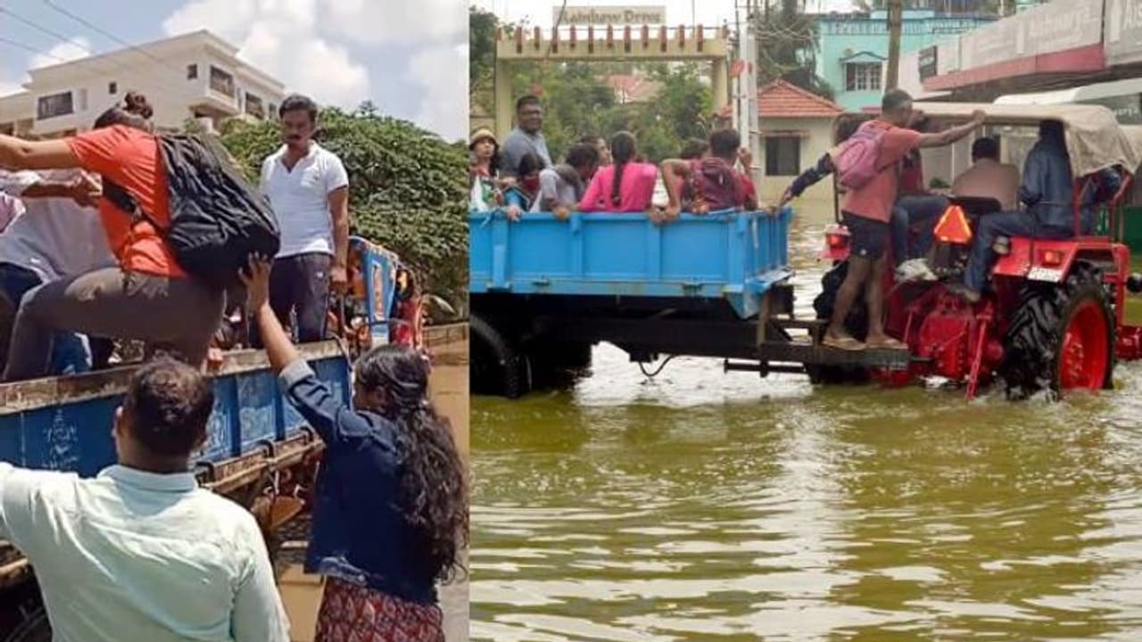 बेंगलुरु में सड़कों पर कमर तक पानी, बस और कार बंद पड़े तो ट्रैक्टर से ऑफिस जाने लगे IT Office के कर्मचारी बेंगलुरु में सड़कों पर कमर तक पानी, बस और कार बंद पड़े तो ट्रैक्टर से ऑफिस जाने लगे IT Office के कर्मचारी