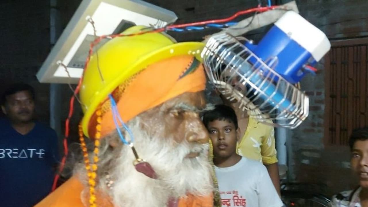 ಸೆಖೆಯಿಂದ ಪಾರಾಗಲು ತಾತನ ಹೊಸ ಟ್ರಿಕ್ಸ್: ಇಂಟರ್‌ನೆಟ್‌ನಲ್ಲಿ ಫೋಟೋ ವೈರಲ್