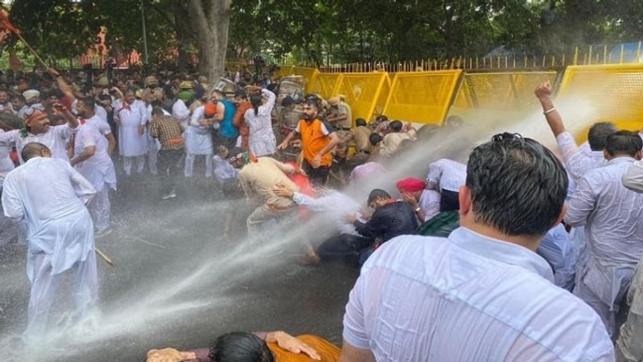 Punjab Police use water cannon on BJP workers protesting against AAP government Punjab Police use water cannon on BJP workers protesting against AAP government