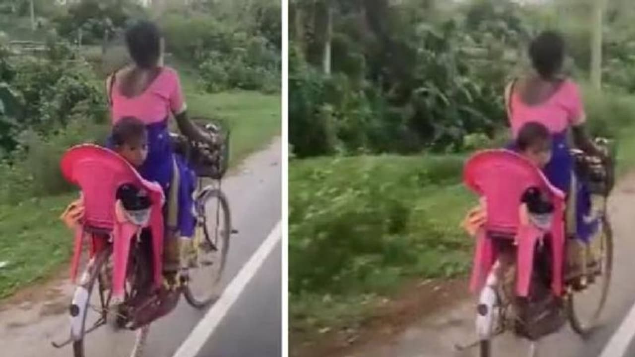സൈക്കിളിൽ കുഞ്ഞിനെ കൊണ്ടുപോകാൻ അമ്മയുടെ കിടിലൻ ഐഡിയ, വൈറലായി വീഡിയോ സൈക്കിളിൽ കുഞ്ഞിനെ കൊണ്ടുപോകാൻ അമ്മയുടെ കിടിലൻ ഐഡിയ, വൈറലായി വീഡിയോ