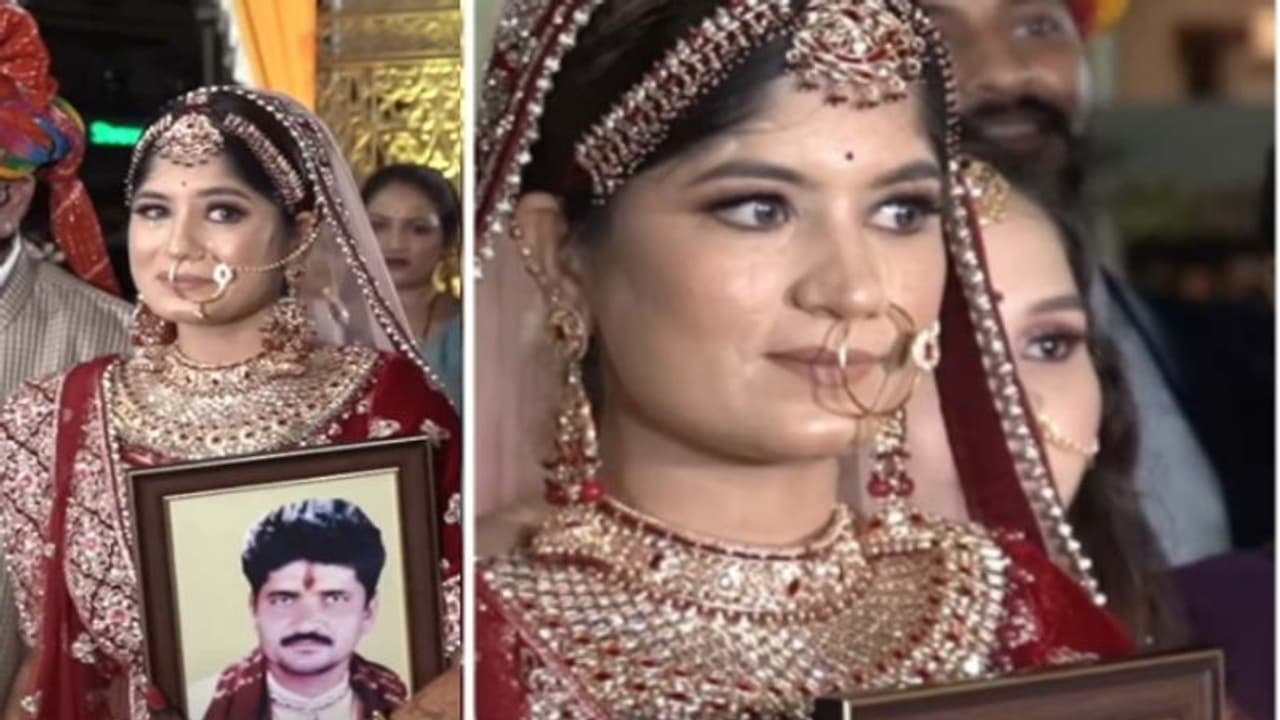അച്ഛന്‍റെ ചിത്രം നെഞ്ചോട് ചേര്‍ത്ത് പിടിച്ച് വധു; സോഷ്യല്‍ മീഡിയയുടെ കണ്ണ് നിറച്ച വീഡിയോ