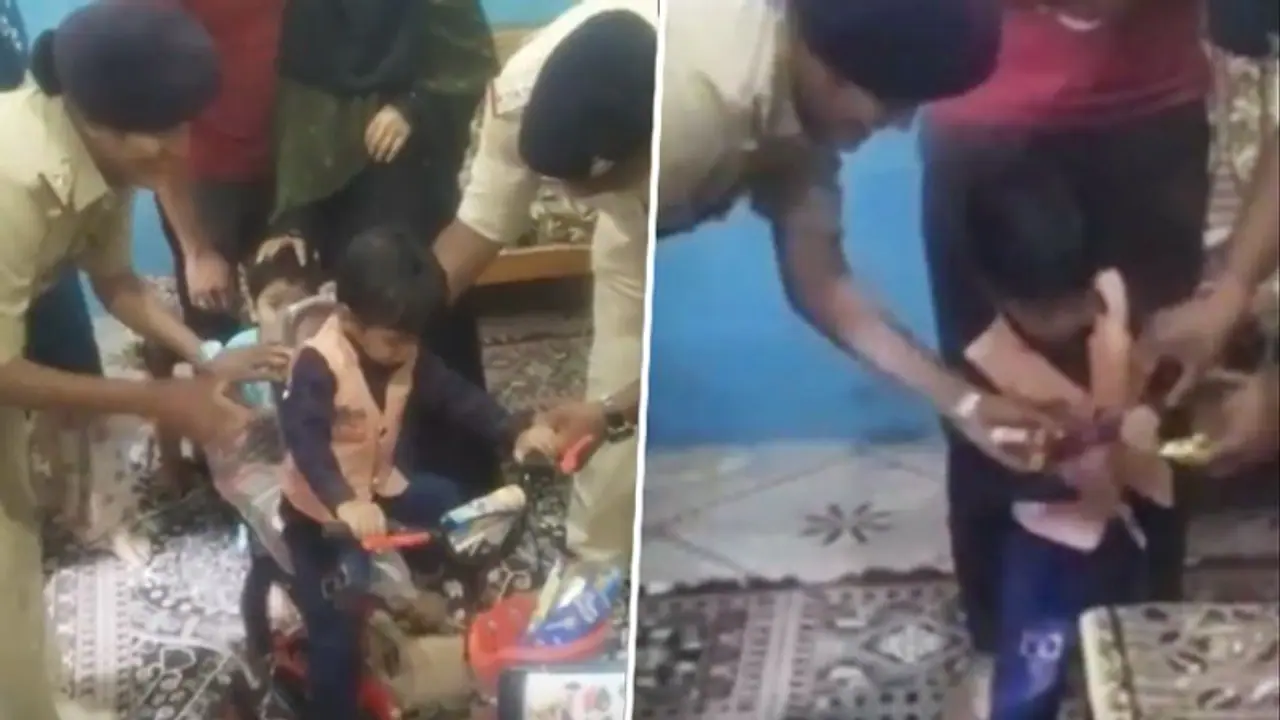 MP Home Minister gifts bicycle, chocolates to the 3 year old boy who complained against his mother