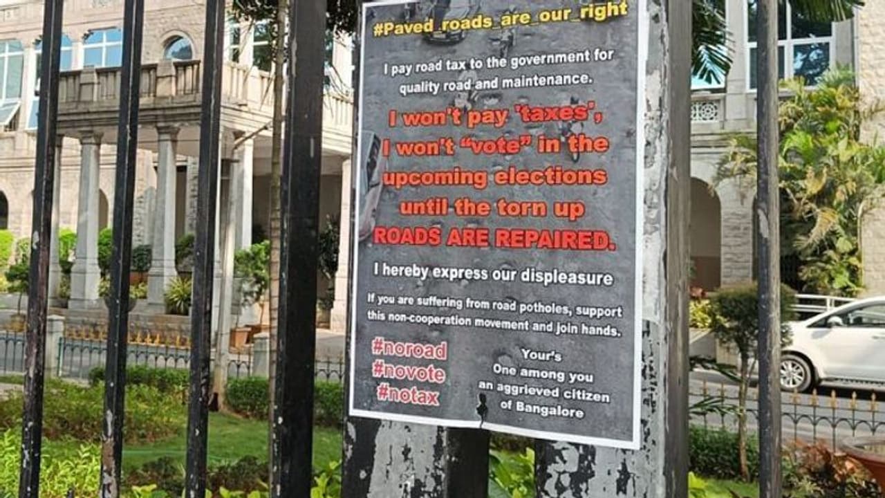 No Road No Tax: ಪೇಸಿಎಂ ನಂತರ ಭಿತ್ತಿ ಪತ್ರಗಳನ್ನು ಅಂಟಿಸಿ ಕಾಂಗ್ರೆಸ್ನಿಂದ ಹೊಸ ಅಭಿಯಾನ No Road No Tax: ಪೇಸಿಎಂ ನಂತರ ಭಿತ್ತಿ ಪತ್ರಗಳನ್ನು ಅಂಟಿಸಿ ಕಾಂಗ್ರೆಸ್ನಿಂದ ಹೊಸ ಅಭಿಯಾನ