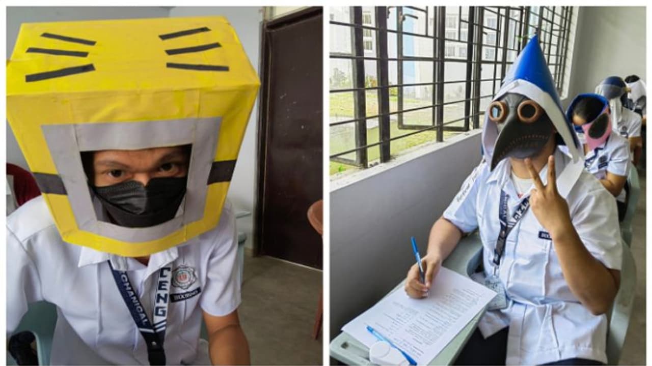 చీటింగ్ చేయకుండా తలకు విచిత్రమైన హ్యాట్స్.. ఫిలిప్పీన్స్ విద్యార్థుల ఫొటోలు వైరల్ చీటింగ్ చేయకుండా తలకు విచిత్రమైన హ్యాట్స్.. ఫిలిప్పీన్స్ విద్యార్థుల ఫొటోలు వైరల్