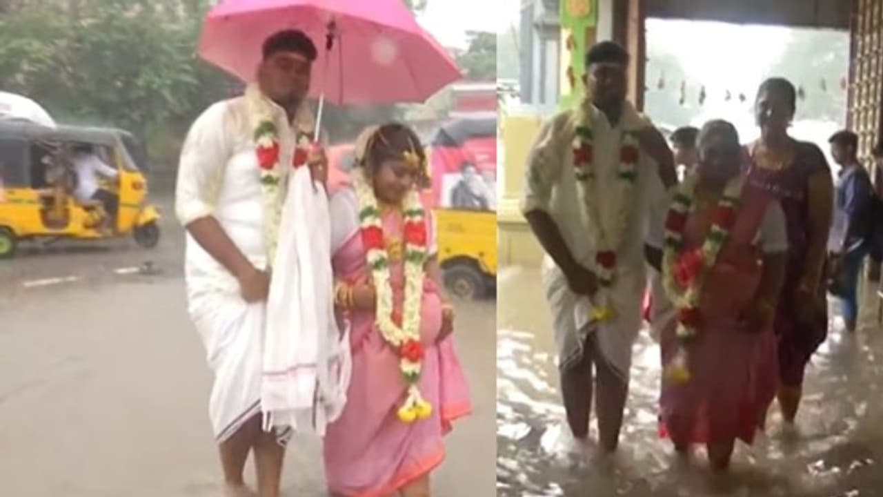 மழையால் தாமதமான திருமணம்… கோயிலில் தேங்கிய நீரில் நனைந்த தம்பதிகள்… நீரை அகற்ற வேண்டுகோள்!! மழையால் தாமதமான திருமணம்… கோயிலில் தேங்கிய நீரில் நனைந்த தம்பதிகள்… நீரை அகற்ற வேண்டுகோள்!!