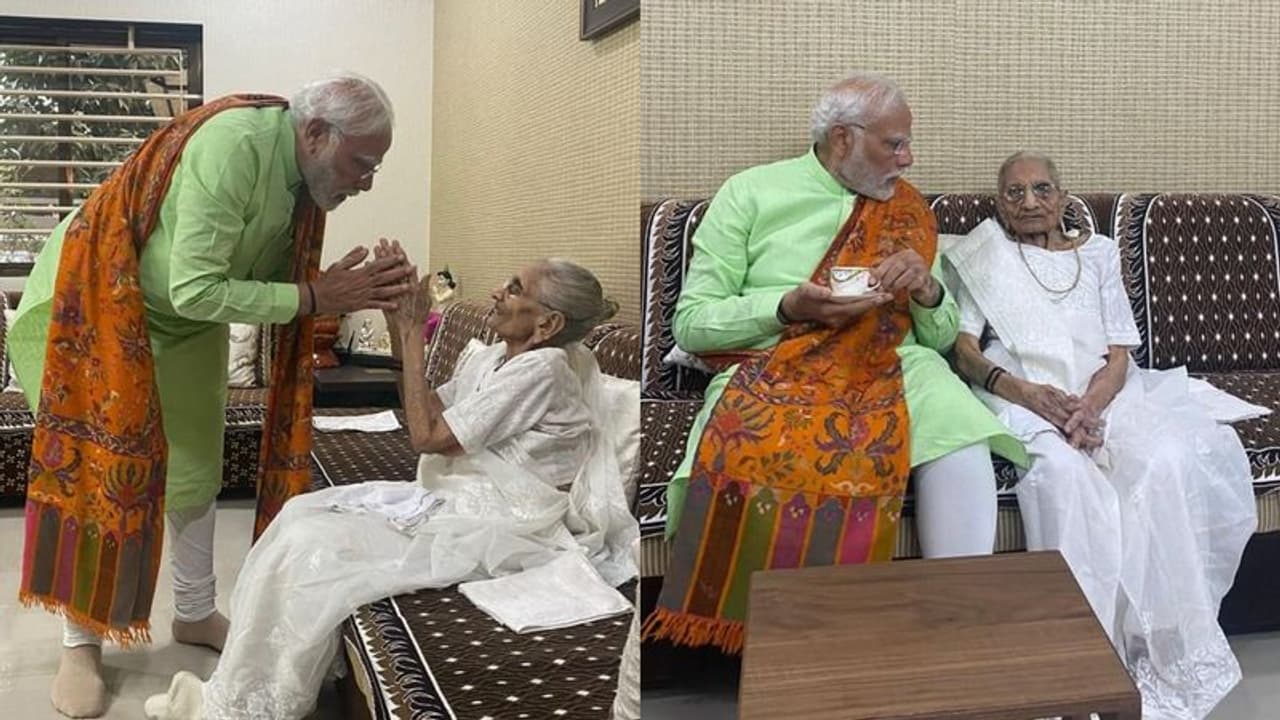Prime Minister Modi takes mother Heeraben's blessings ahead of Gujarat Election Phase 2 Prime Minister Modi takes mother Heeraben's blessings ahead of Gujarat Election Phase 2