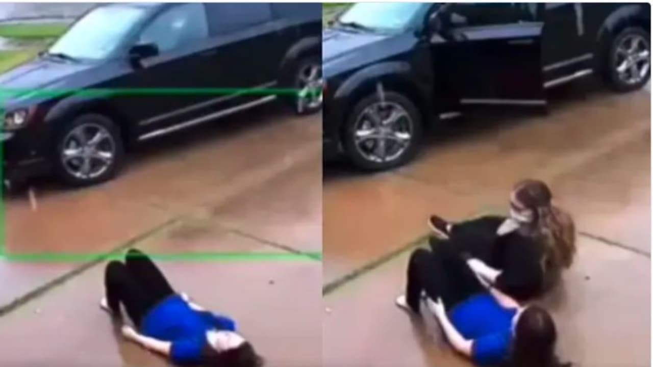 മകൾക്കൊപ്പം റോഡരികിൽ മഴയിൽ കിടന്ന് അമ്മ; കാരണം ഇതാണ്... മകൾക്കൊപ്പം റോഡരികിൽ മഴയിൽ കിടന്ന് അമ്മ; കാരണം ഇതാണ്...