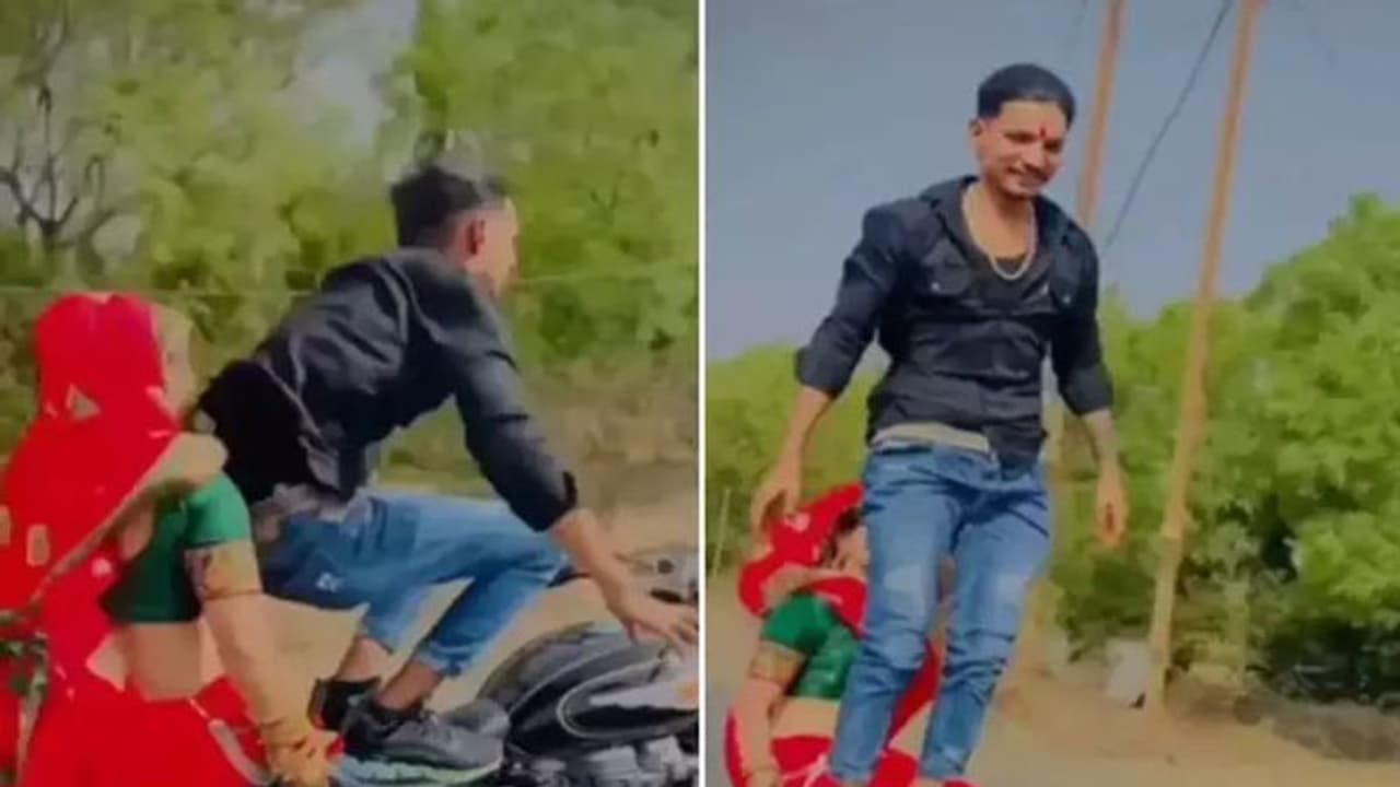 घूंघट में पत्नी को बुलेट पर बैठाया और करने लगा खतरनाक स्टंट, Video देख लोगों के उड़ गए होश घूंघट में पत्नी को बुलेट पर बैठाया और करने लगा खतरनाक स्टंट, Video देख लोगों के उड़ गए होश