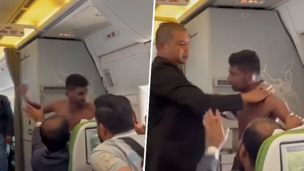 Another mid air brawl goes viral; Shirtless man punched co passenger Another mid air brawl goes viral; Shirtless man punched co passenger