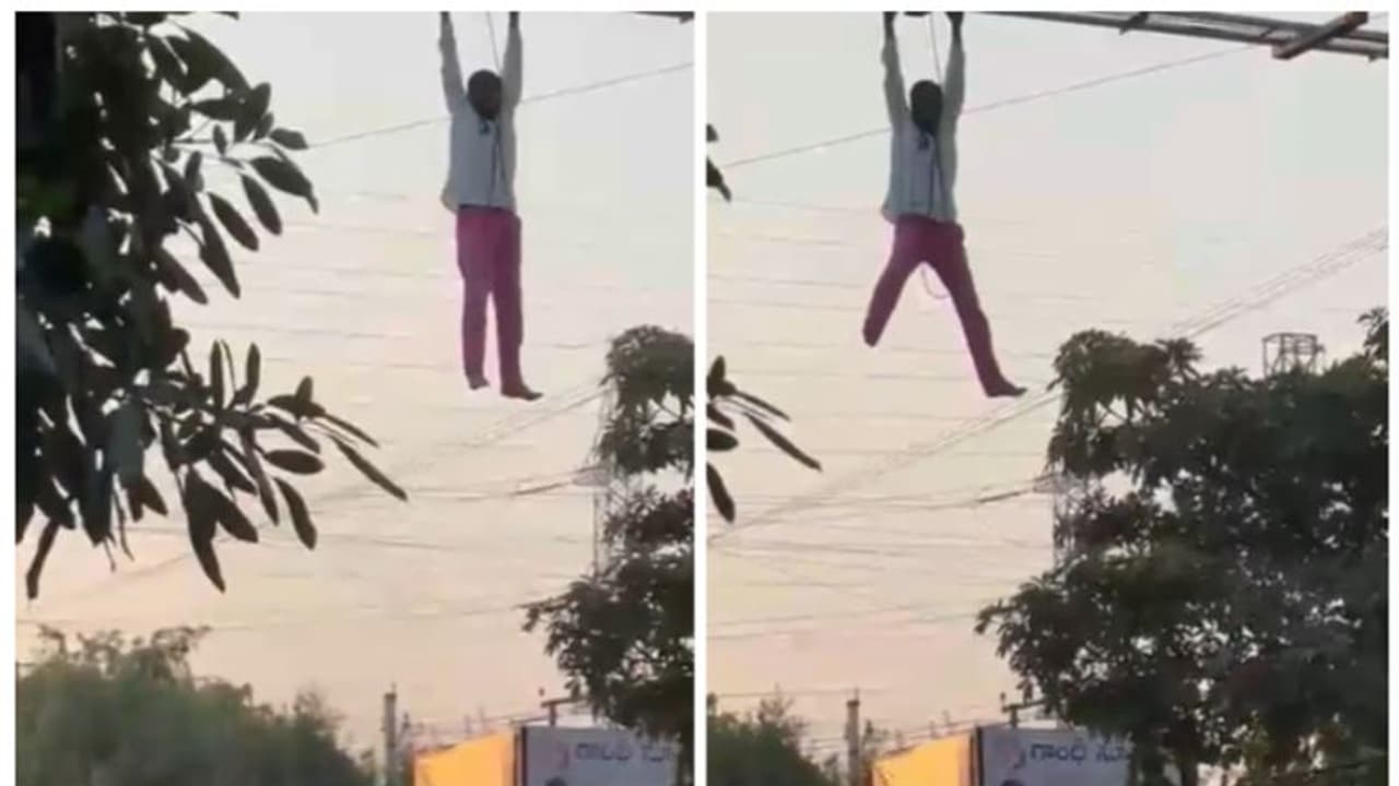 సిద్దిపేటలో మద్యం మత్తులో బిల్బోర్డుకు వేలాడిన మందుబాబు.. వైరల్ వీడియో ఇదే సిద్దిపేటలో మద్యం మత్తులో బిల్బోర్డుకు వేలాడిన మందుబాబు.. వైరల్ వీడియో ఇదే