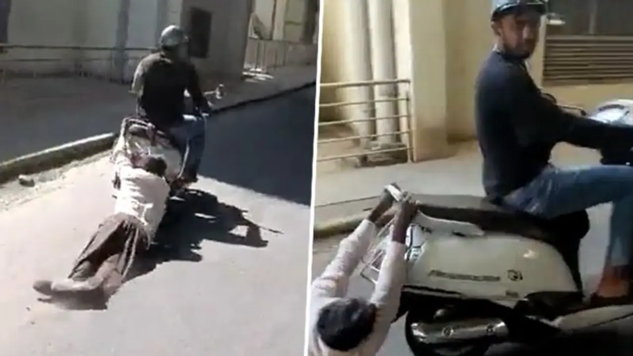 Bengaluru horror: 71 year old man dragged by two wheeler; driver detained | WATCH Bengaluru horror: 71 year old man dragged by two wheeler; driver detained | WATCH
