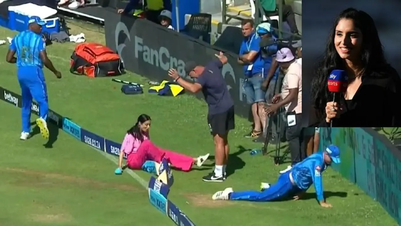 പന്ത് ബൗണ്ടറി കടക്കുന്നത് തടയാന് ശ്രമിച്ച ഫീല്ഡര് അവതാരകയെ മറിച്ചിട്ടു; എന്നിട്ടും ലൈവ് തുടര്ന്ന് സൈനാബ് പന്ത് ബൗണ്ടറി കടക്കുന്നത് തടയാന് ശ്രമിച്ച ഫീല്ഡര് അവതാരകയെ മറിച്ചിട്ടു; എന്നിട്ടും ലൈവ് തുടര്ന്ന് സൈനാബ്