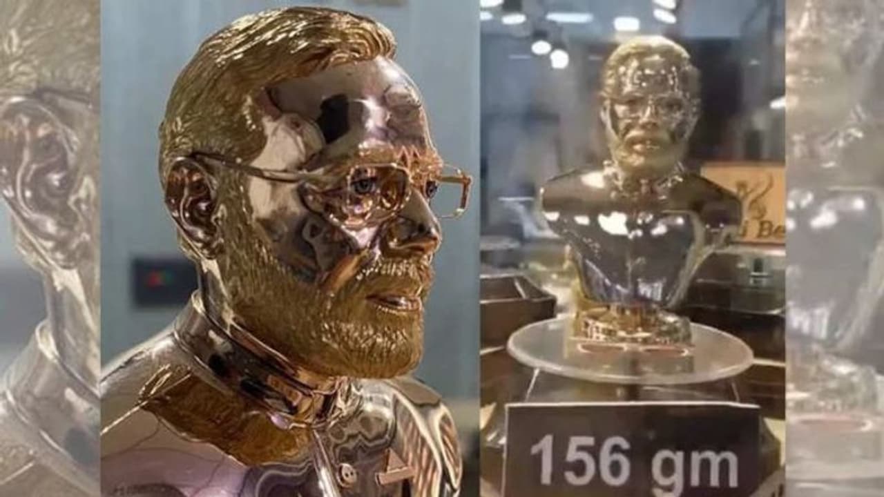 156 గ్రాములతో ప్రధాని మోడీ బంగారు విగ్రహం.. అభిమానం చాటిన సూరత్ వ్యాపారి