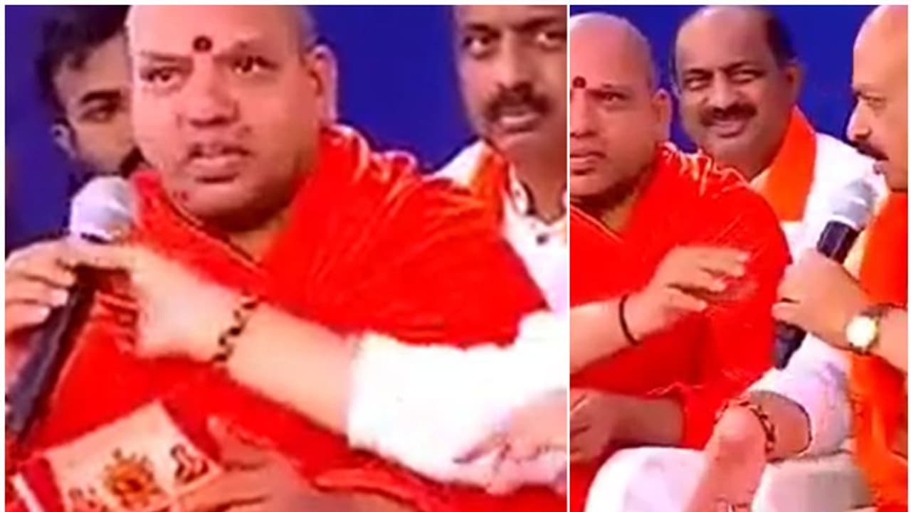 അടുത്തിരുത്തി നാടിന്‍റെ പ്രശ്നങ്ങള്‍ പറഞ്ഞ് സന്യാസി; അസ്വസ്ഥനായി, ഉടനെ മൈക്ക് പിടിച്ച് വാങ്ങി മുഖ്യമന്ത്രി