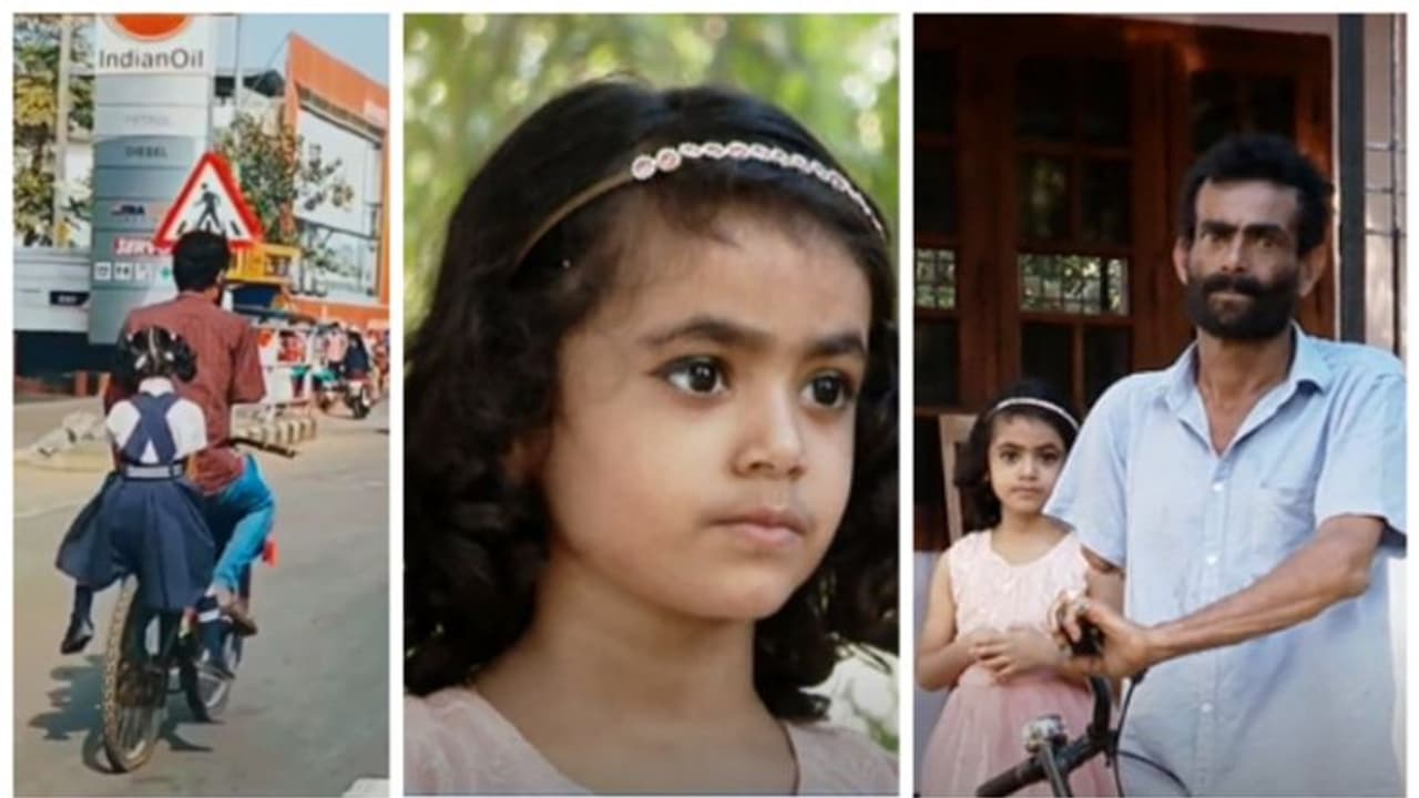 ഒറ്റക്കൈയ്യിൽ സൈക്കിളോടിച്ച് അച്ഛൻ, ചിരിച്ചുല്ലസിച്ച് പിന്നില് യുകെജിക്കാരി; ആ വൈറൽ യാത്രക്കാർ ഇവിടെയുണ്ട്... ഒറ്റക്കൈയ്യിൽ സൈക്കിളോടിച്ച് അച്ഛൻ, ചിരിച്ചുല്ലസിച്ച് പിന്നില് യുകെജിക്കാരി; ആ വൈറൽ യാത്രക്കാർ ഇവിടെയുണ്ട്...