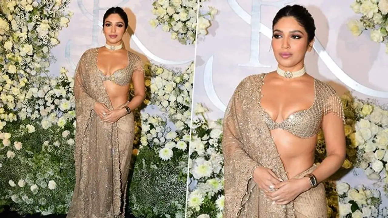 Bhumi Pednekar upped style quotient in her golden saree at Sidharth Kiara's wedding reception bash Bhumi Pednekar upped style quotient in her golden saree at Sidharth Kiara's wedding reception bash