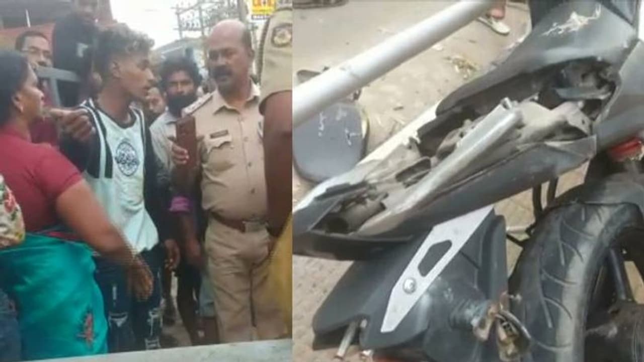 വനിതാ സുഹൃത്തിനെ ചൊല്ലി കൂട്ടുകാരുടെ തമ്മില് തല്ല്, നടുറോഡിൽ ബൈക്ക് അടിച്ച് തകർത്തു വനിതാ സുഹൃത്തിനെ ചൊല്ലി കൂട്ടുകാരുടെ തമ്മില് തല്ല്, നടുറോഡിൽ ബൈക്ക് അടിച്ച് തകർത്തു