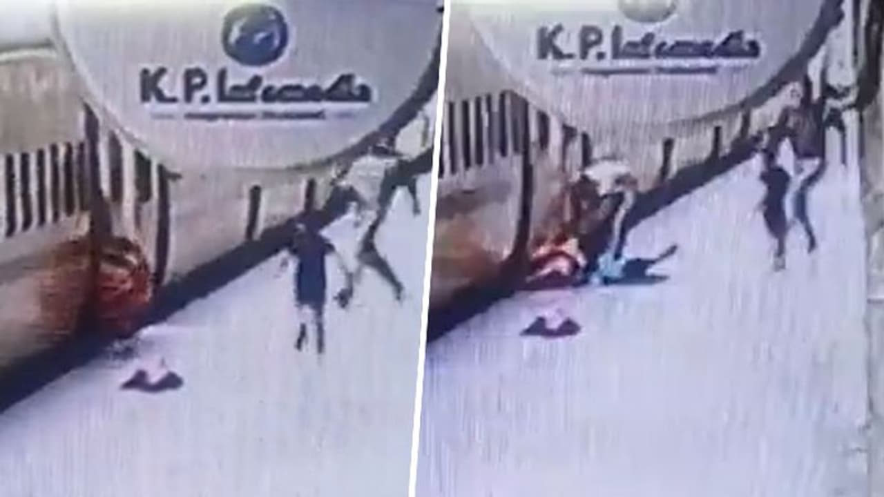 UP police saves woman, child who slipped while deboarding moving train in Kanpur; watch video
