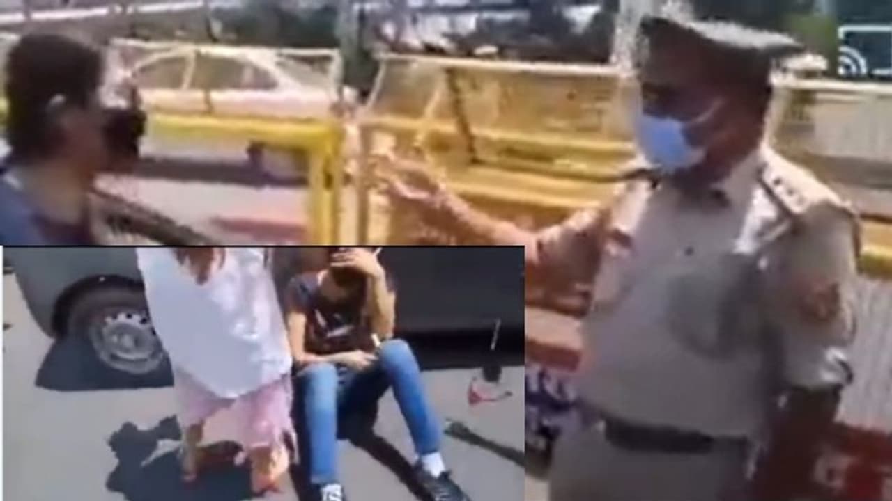 ಕಾರಿನ ದಾಖಲೆ ಕೇಳಿದ್ದಕ್ಕೆ ಯುವತಿ ಹೈಡ್ರಾಮಾ: ನಡು ರಸ್ತೆಯಲ್ಲಿ ಬಿದ್ದು ಅತ್ತು ಗೋಳಾಡಿದ ಹುಡುಗಿ