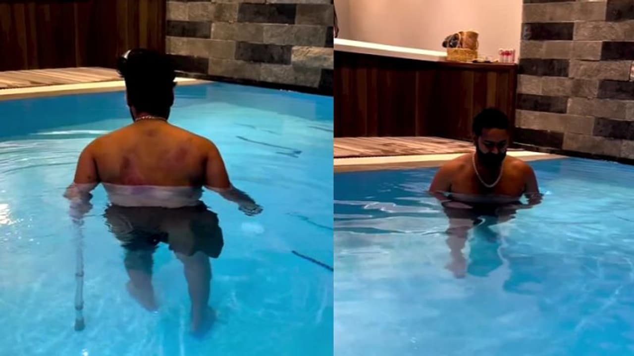 காயம் பட்ட தழும்புகளுடன் தண்ணீருக்குள் வாக்கிங் ஸ்டிக் வச்சு நடைபயிற்சி செய்யும் ரிஷப் பண்ட்!