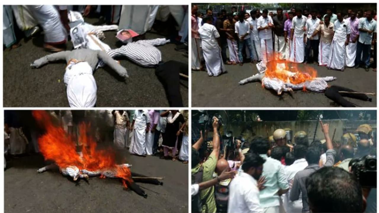 യൂത്ത് കോൺ​ഗ്രസ് പ്രതിഷേധം; മാധ്യമപ്രവർത്തകരുടെ ക്യാമറകൾ തട്ടിമാറ്റി, വാക്കേറ്റം; കോലം കത്തിച്ചു